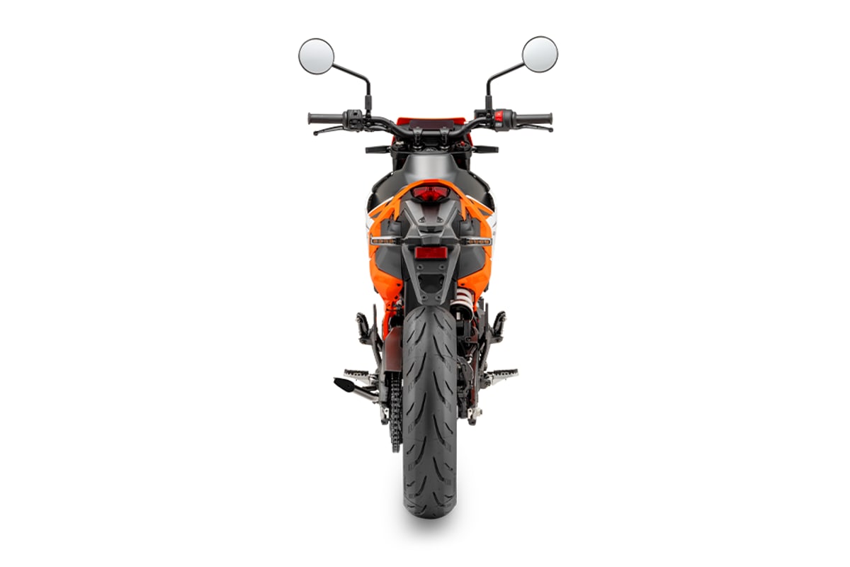 KTM 390 SMC R rear studio view showing the tail section, rear disc and exhaust