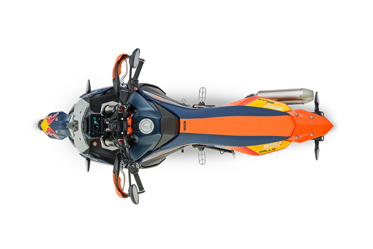 KTM 890 Adventure R Rally seen from above and behind on the left, showing the flat rally seat and tank layout