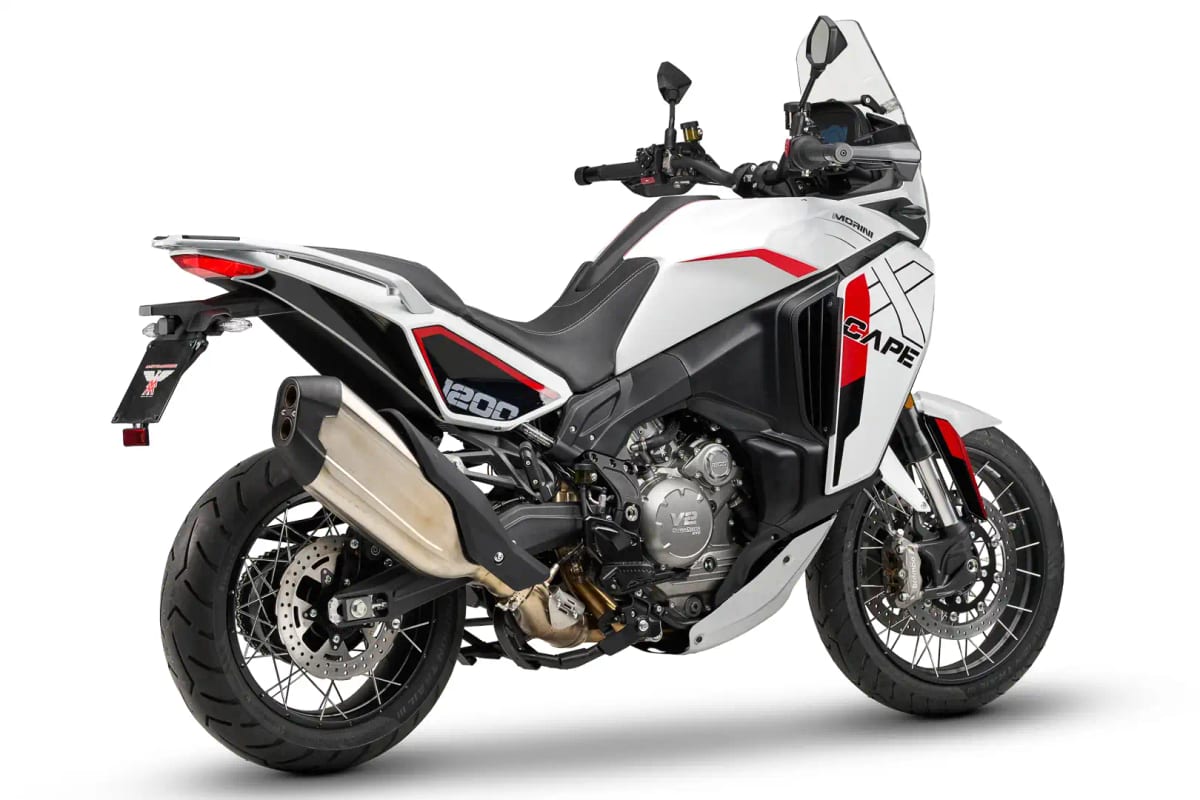 Moto Morini X-Cape 1200 rear three-quarter studio view showing the tail rack, twin exhaust outlets and X-Cape graphics on the tail section