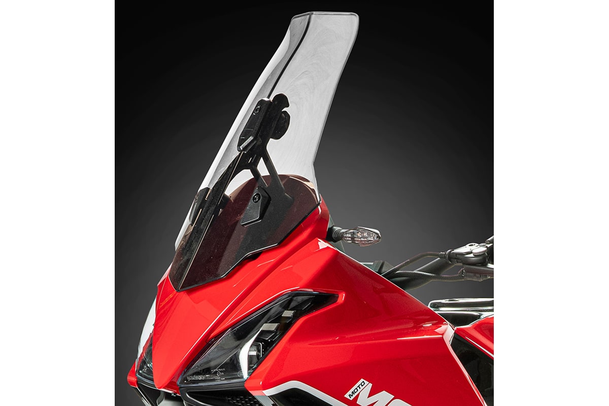 Front detail of the Moto Morini X-Cape 650 showing the adjustable windscreen, LED headlight and red beak fairing
