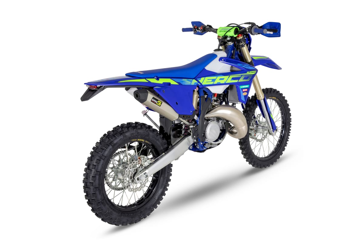 125 SE Factory rear three-quarter angle from the other side, showing the exhaust muffler, rear disc brake and swingarm
