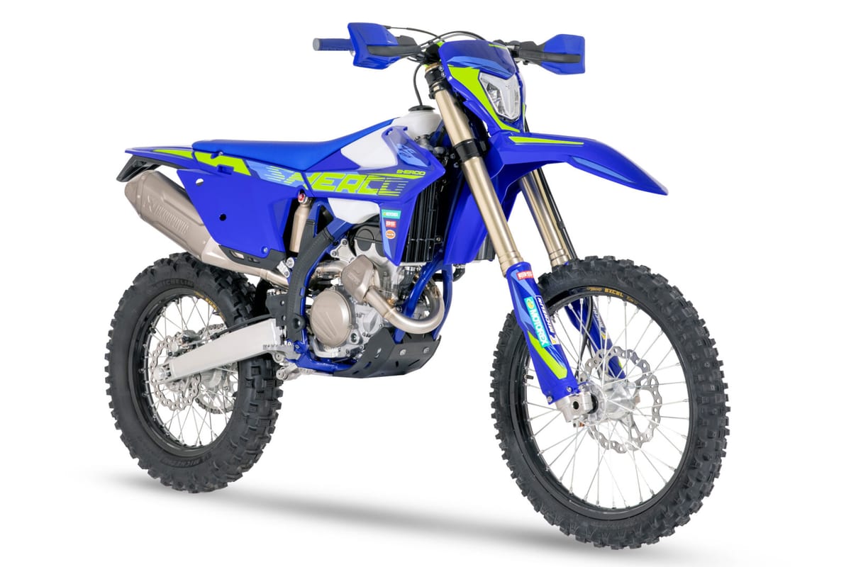 2027 Sherco 250 SEF Factory, front three-quarter studio view highlighting the white radiator shrouds, Excel spoked wheels and Motorex fork stickers