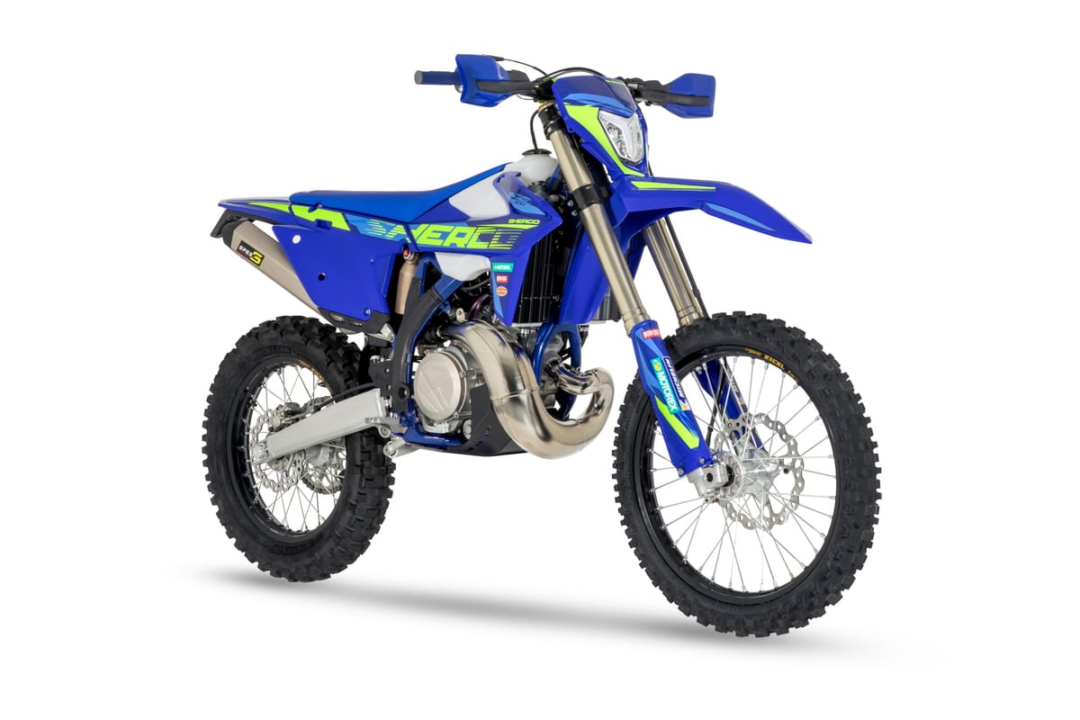 Sherco 300 SE Factory front three-quarter close-up showing the LED headlight, WP-style forks and blue-and-yellow bodywork