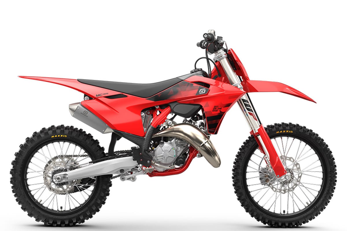 2027 GasGas MC 125 motocross bike in red with black seat, right-side studio profile showing the chrome exhaust and MC 125 graphics