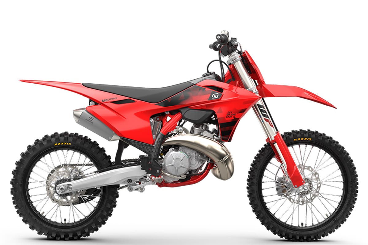 2026 GasGas MC 250 two-stroke motocross bike in red with black seat, right-side studio profile showing WP inverted fork and expansion chamber exhaust