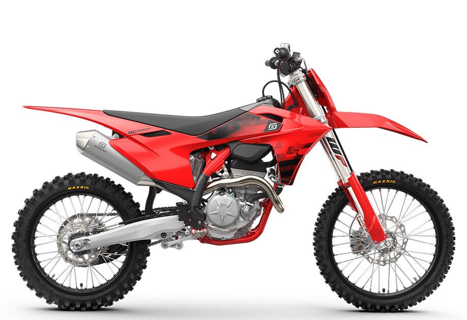 2027 GasGas MC 250F motocross bike in red and black, right-side studio profile showing the WP forks, silver muffler and Maxxis knobby tires