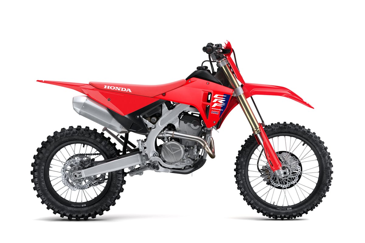 2027 Honda CRF250RX cross-country bike in red with black seat, left-side studio profile showing gold-coated forks and twin-spar aluminum frame
