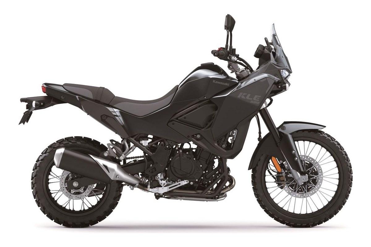 2026 Kawasaki KLE500 ABS adventure bike in white with green trellis frame, right-side studio profile showing spoked wheels and tall windscreen