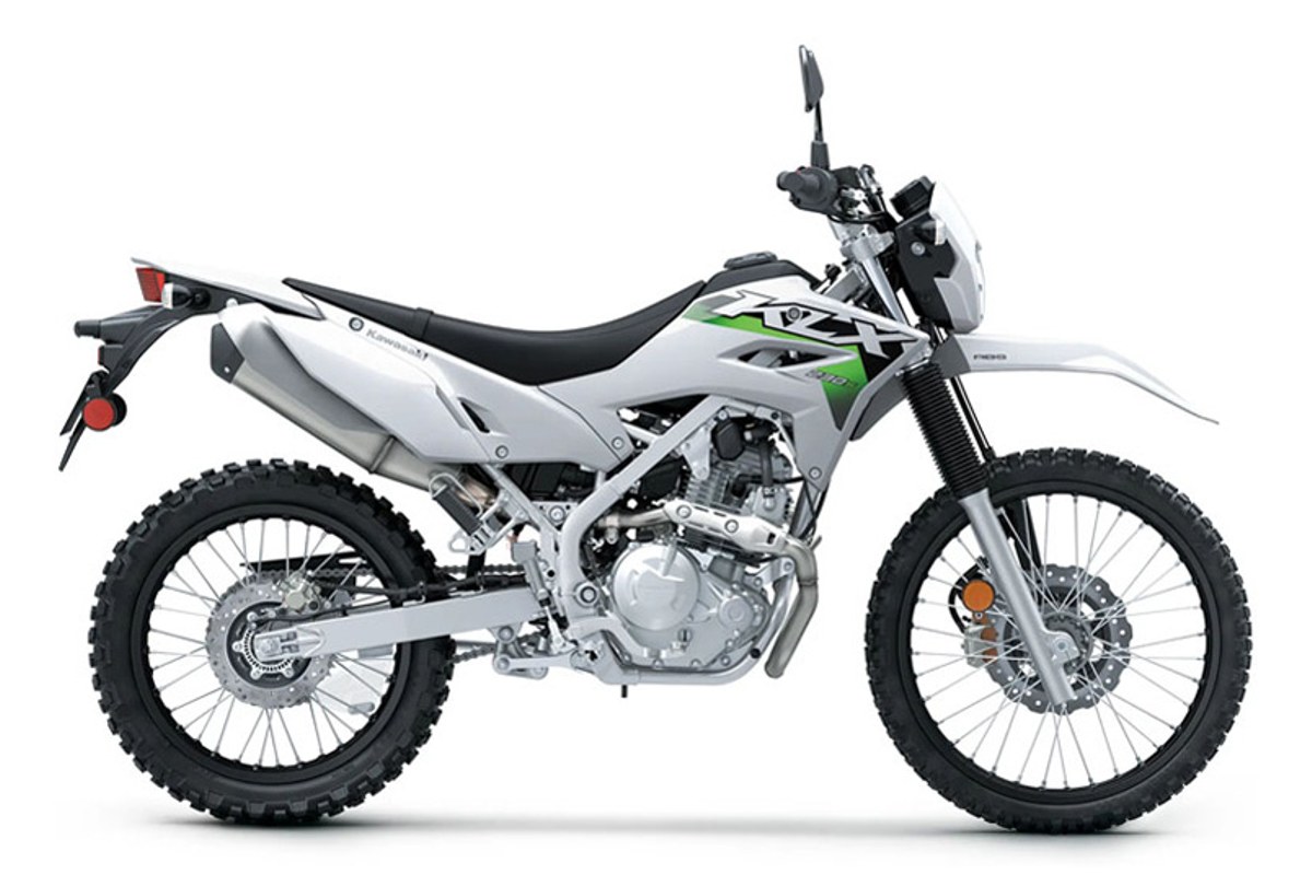 2027 Kawasaki KLX230 S ABS dual-sport in white and green, right-side studio profile showing the front disc brake and knobby dual-sport tires