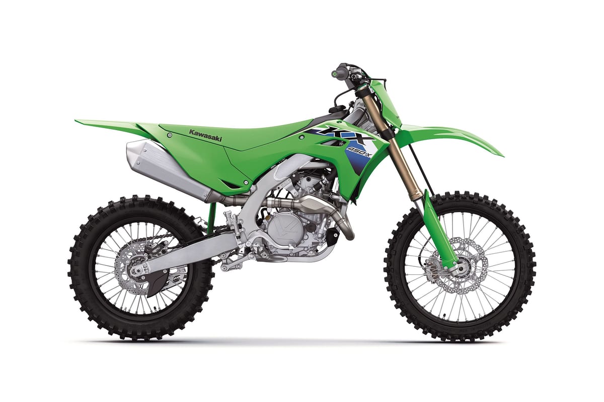 2027 Kawasaki KX450X cross-country bike in lime green, right-side studio profile showing the works-style pipe and blue KX-X graphics