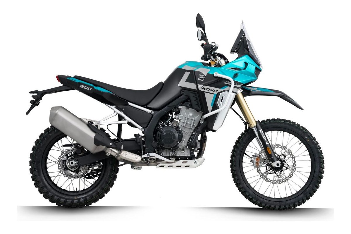2026 Kove 800X Rally adventure motorcycle in teal and black, right-side studio profile with beak fairing, wire-spoke wheels and knobby dual-sport tires