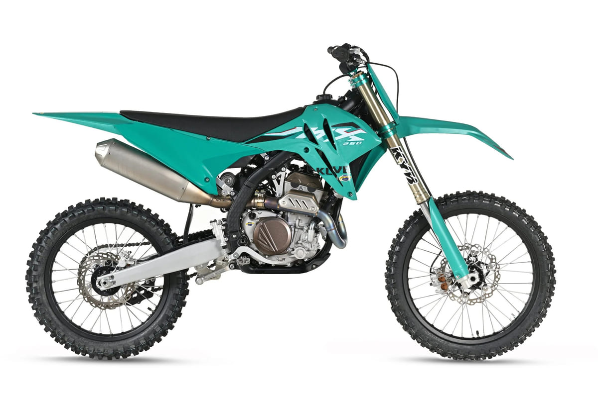 2026 Kove MX250 motocross bike in teal bodywork with black seat, right-side studio profile showing gold KYB fork and silver muffler