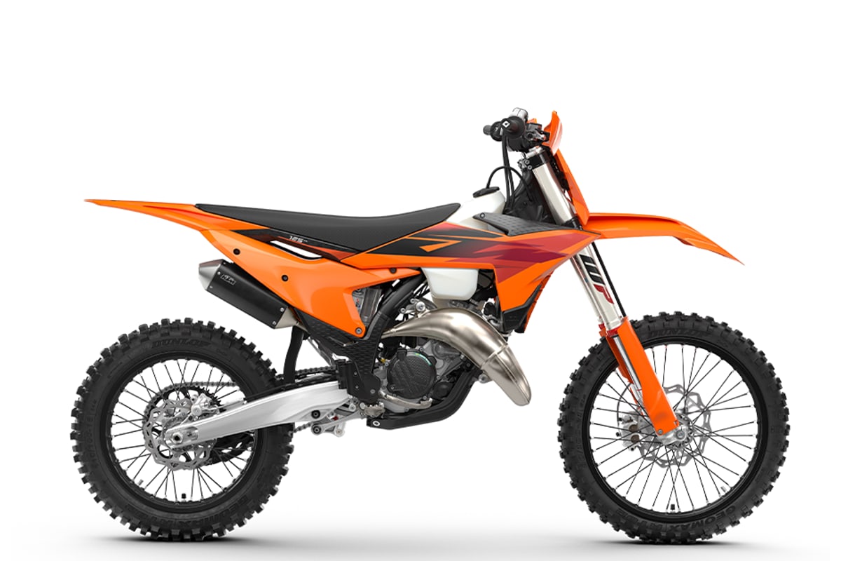2027 KTM 125 XC two-stroke cross-country bike in orange, right-side studio profile showing the WP XACT fork and expansion chamber
