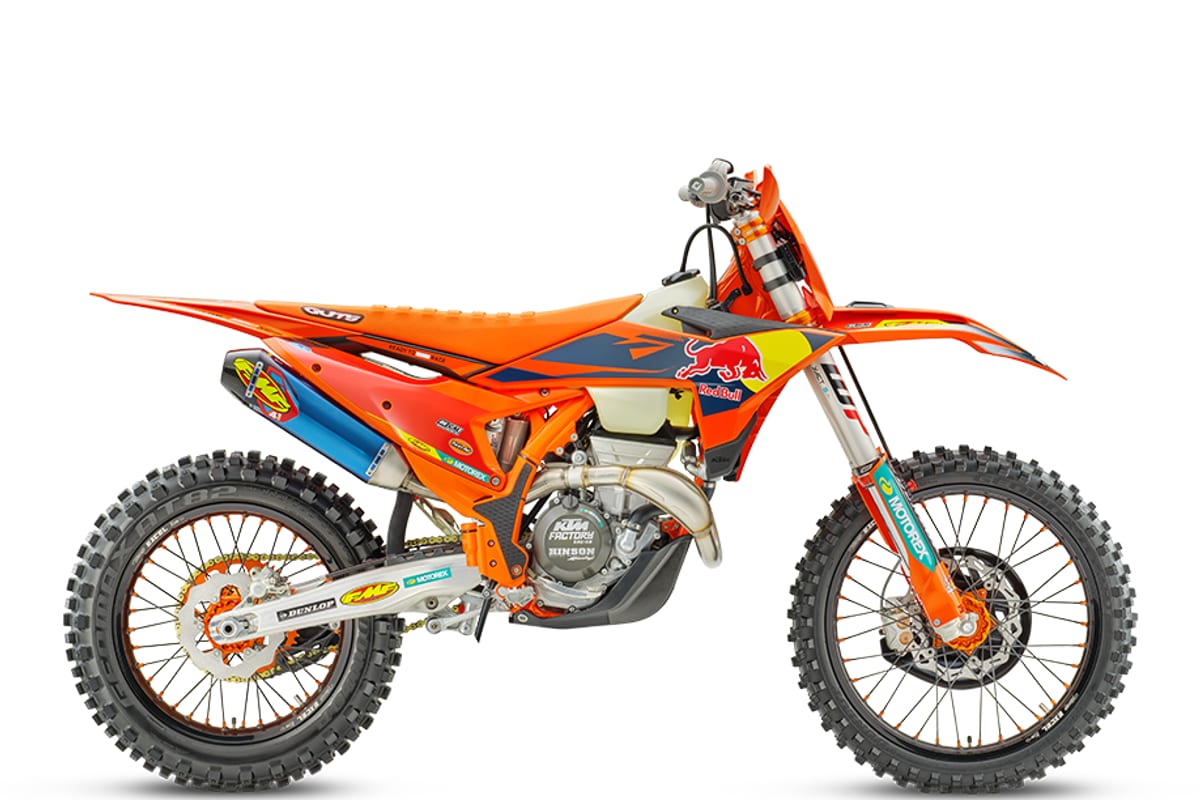 2027 KTM 350 XC-F Factory Edition dirt bike in orange with Red Bull livery, left-side studio profile showing the FMF exhaust and WP forks
