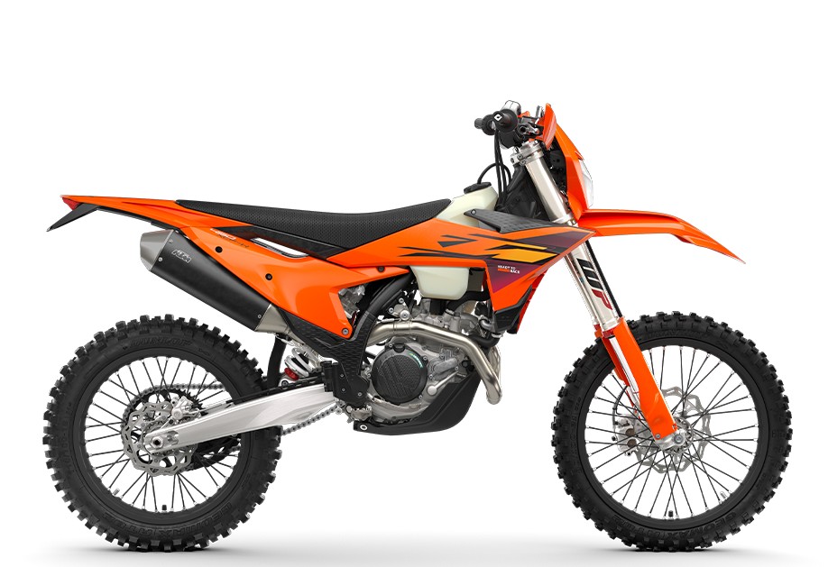 2027 KTM 450 XCF-W enduro bike in orange with white tank and yellow-purple graphics, right-side studio profile on white background