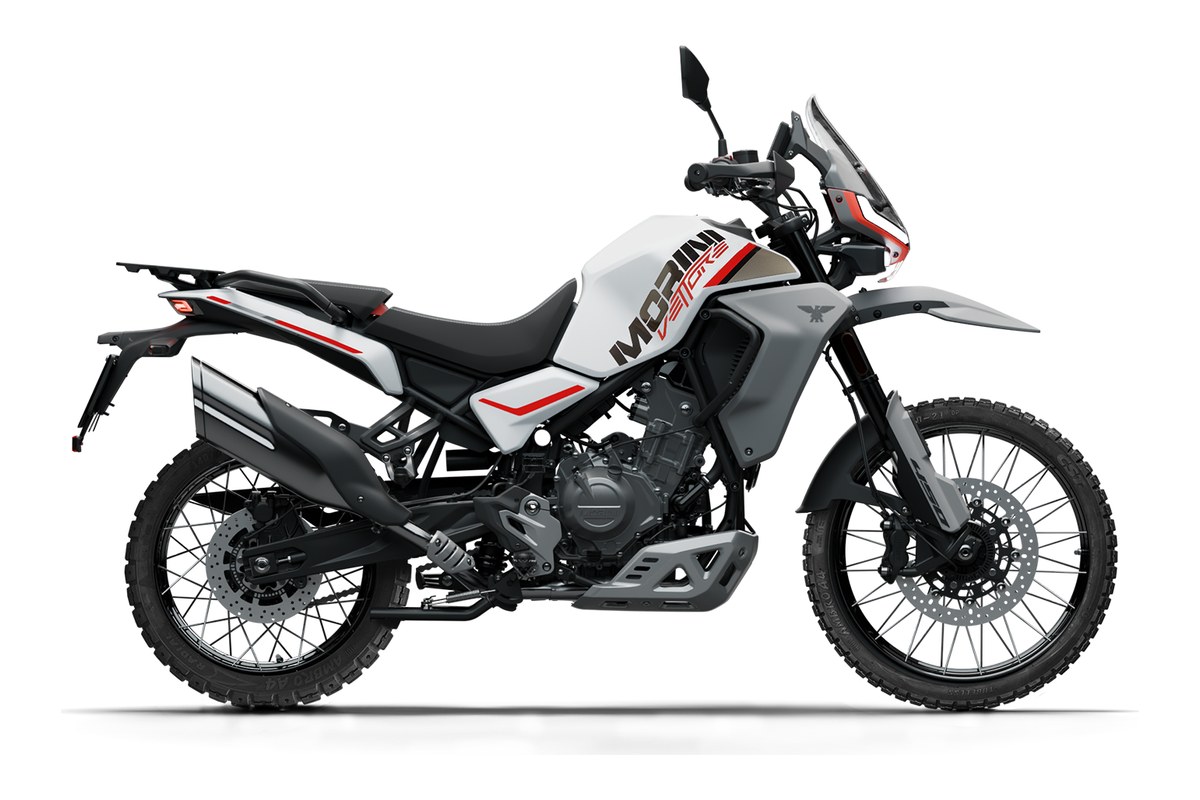 2026 Moto Morini Vettore 450 adventure motorcycle in white with red and grey accents, right-side studio profile showing spoked wheels and beak fender