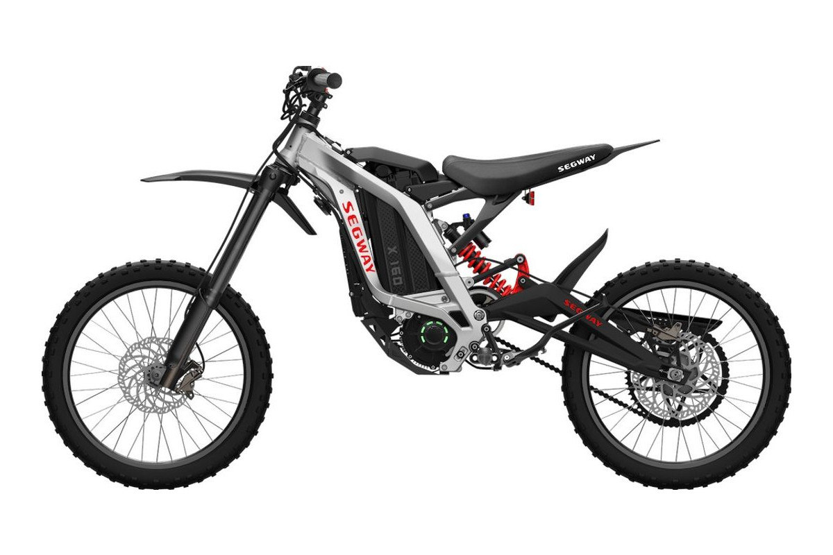 Segway X160 electric dirt bike in silver and black, right-side studio profile on a white background