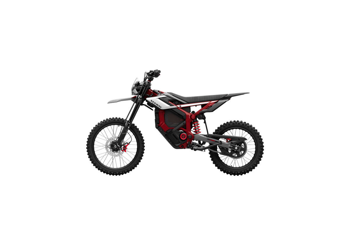 2026 Segway Xaber 300 electric dirt bike in Shred Velvet red and silver, side studio view on a white background
