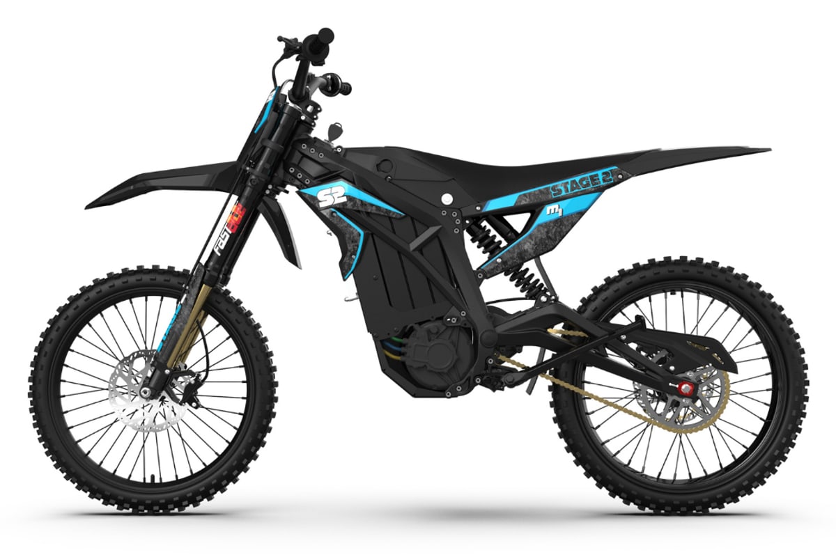 2026 Stage2 M1 electric dirt bike in black with cyan graphics, left-side studio profile on a white background