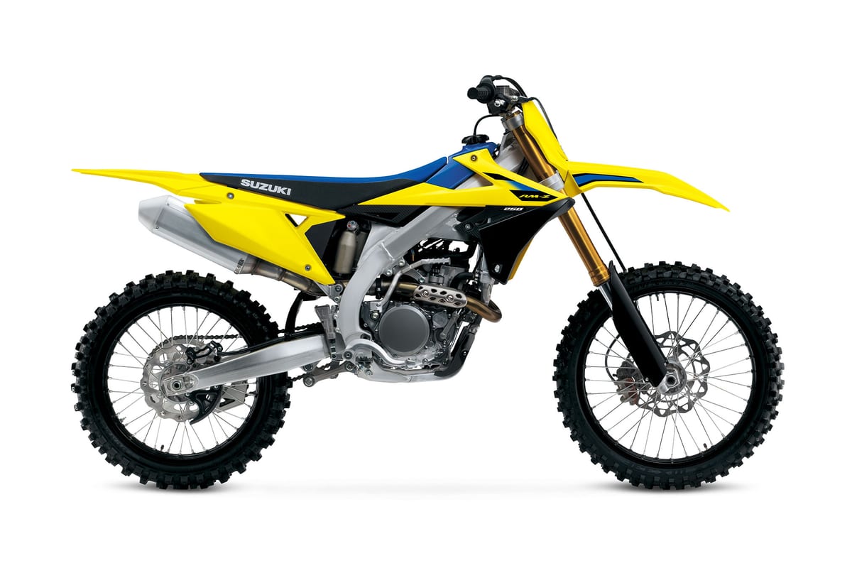 2027 Suzuki RM-Z250 motocross bike in yellow and blue, right-side studio profile with gold forks and knobby tires on a white background