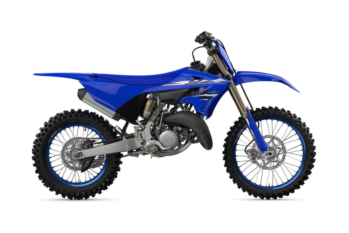 2027 Yamaha YZ125X two-stroke motorcycle in blue, right-side studio profile showing the gold forks, spoke wheels and slim bodywork