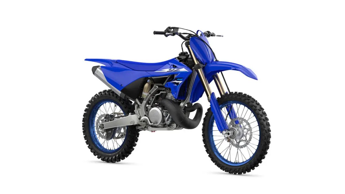 2027 Yamaha YZ250 two-stroke motocross bike in blue with white graphics, right-side studio profile showing gold forks and blue-rimmed wheels