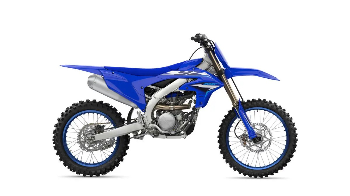 2027 Yamaha YZ250F motocross bike in blue, right-side studio profile showing KYB fork, silver exhaust and blue-hubbed spoked wheels